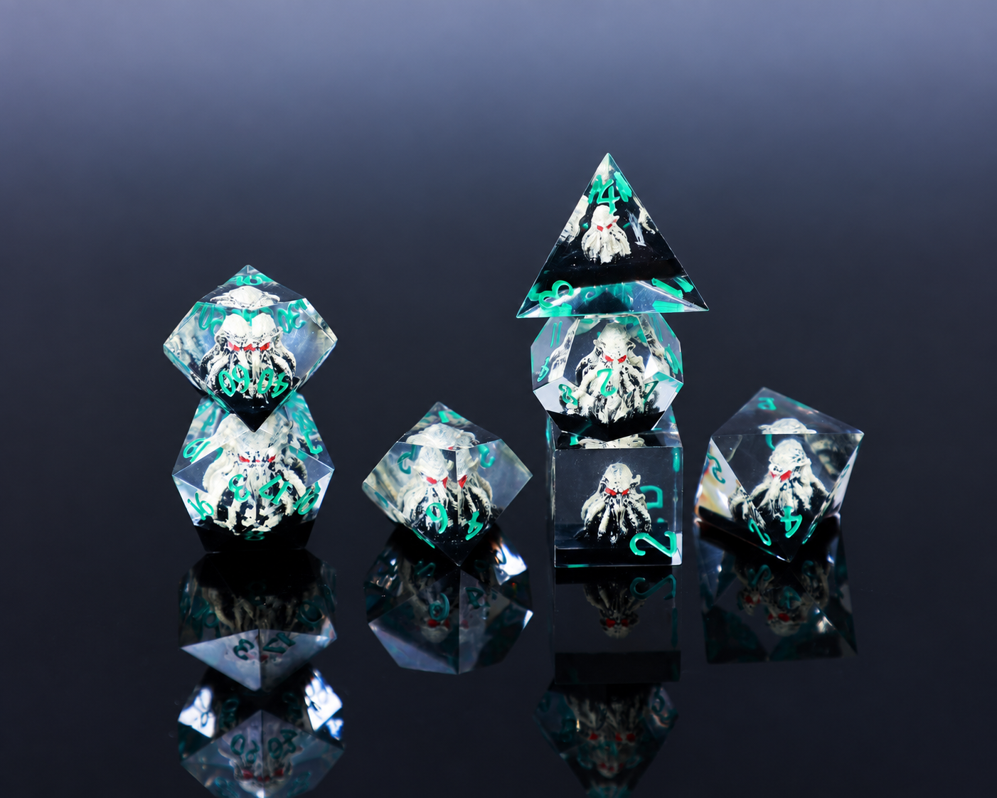 Clear resin dice with white creature inclusions and turquoise numerals